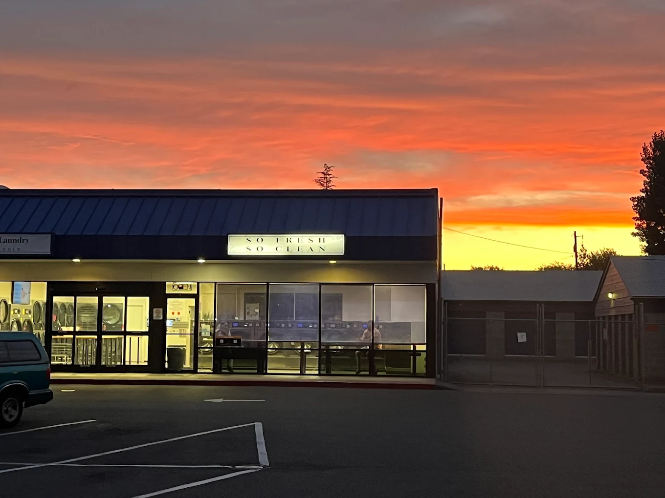 Clean Life Laundry storefront at sunset